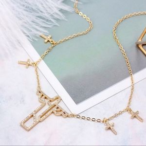 Dazzling Classic Christian Jesus zircon cross zircon gold plated charm necklace.